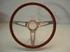 Volante legno tre razze piatte lucido. � 350mm.